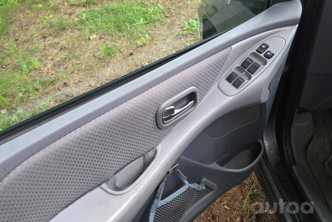 Nissan Almera Tino 1 generation [restyling]